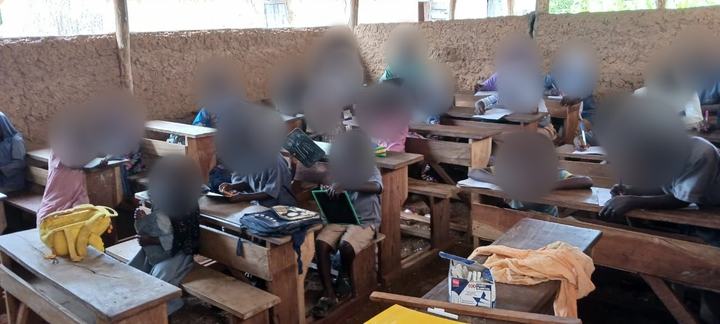 Students in class, June 2025. Faces blurred for privacy.